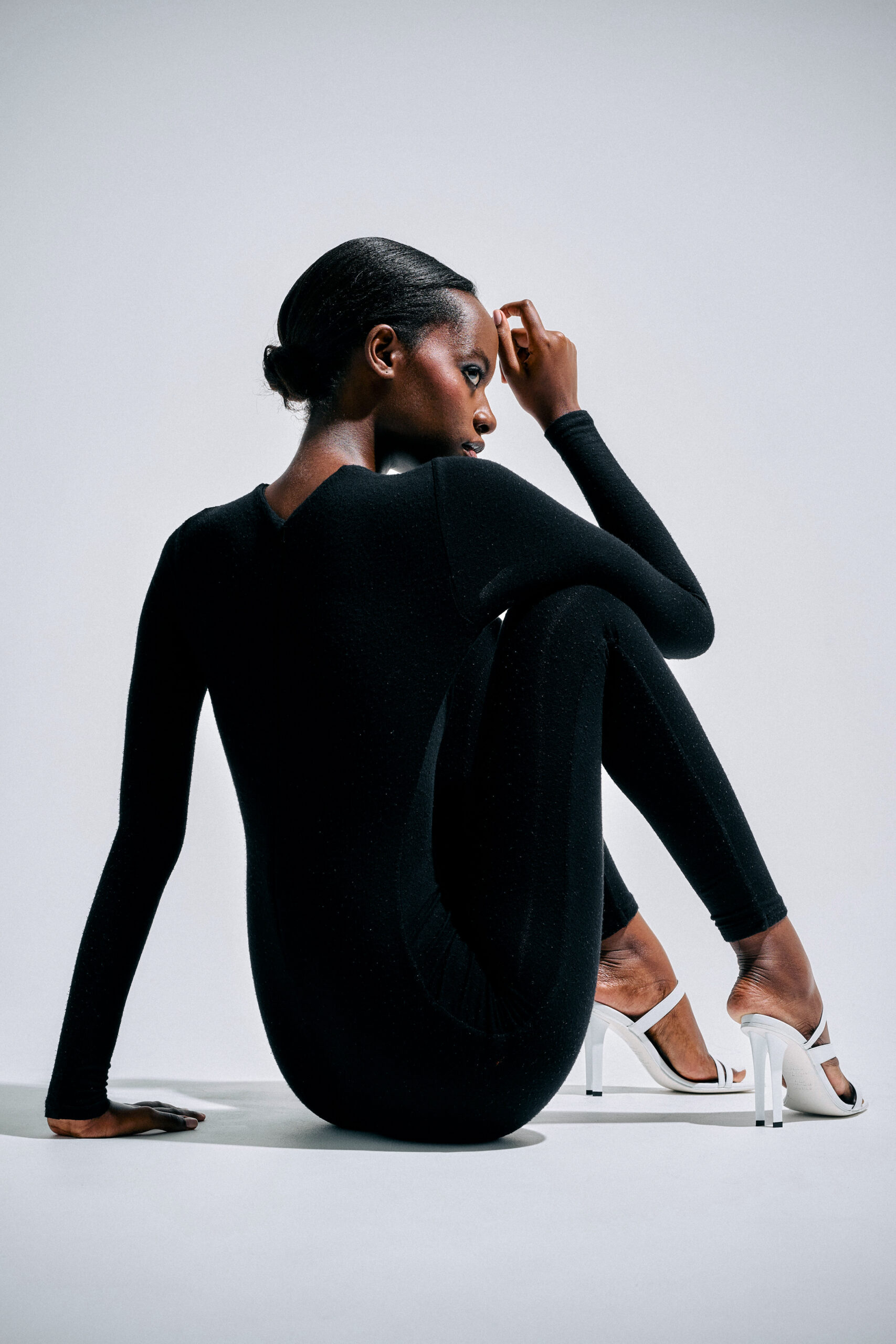Model wearing the SHEWAK Zaha Sandal White.