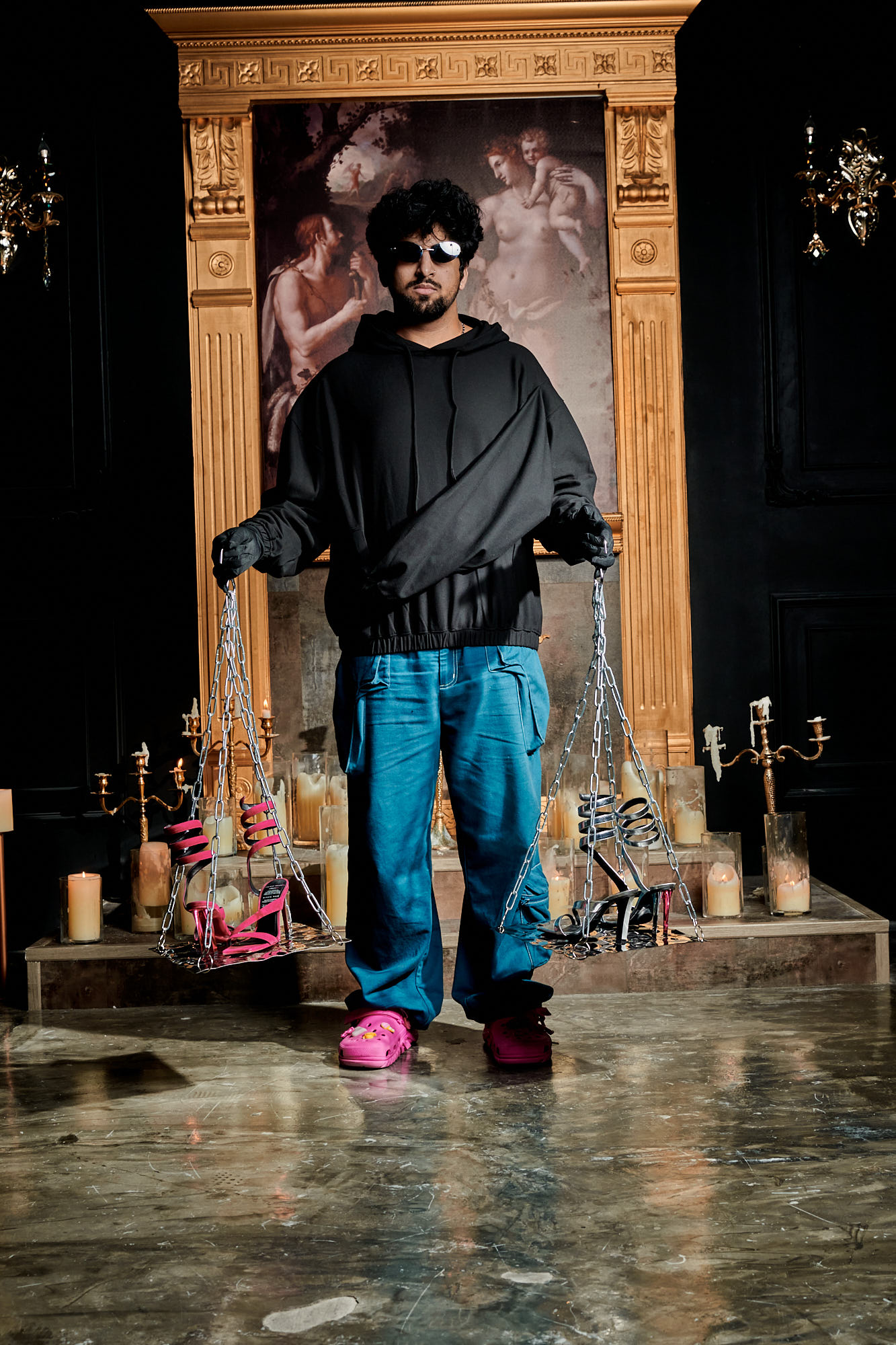 Nish Shewak, founder and creative director of SHEWAK, showcasing architectural double-heel shoes