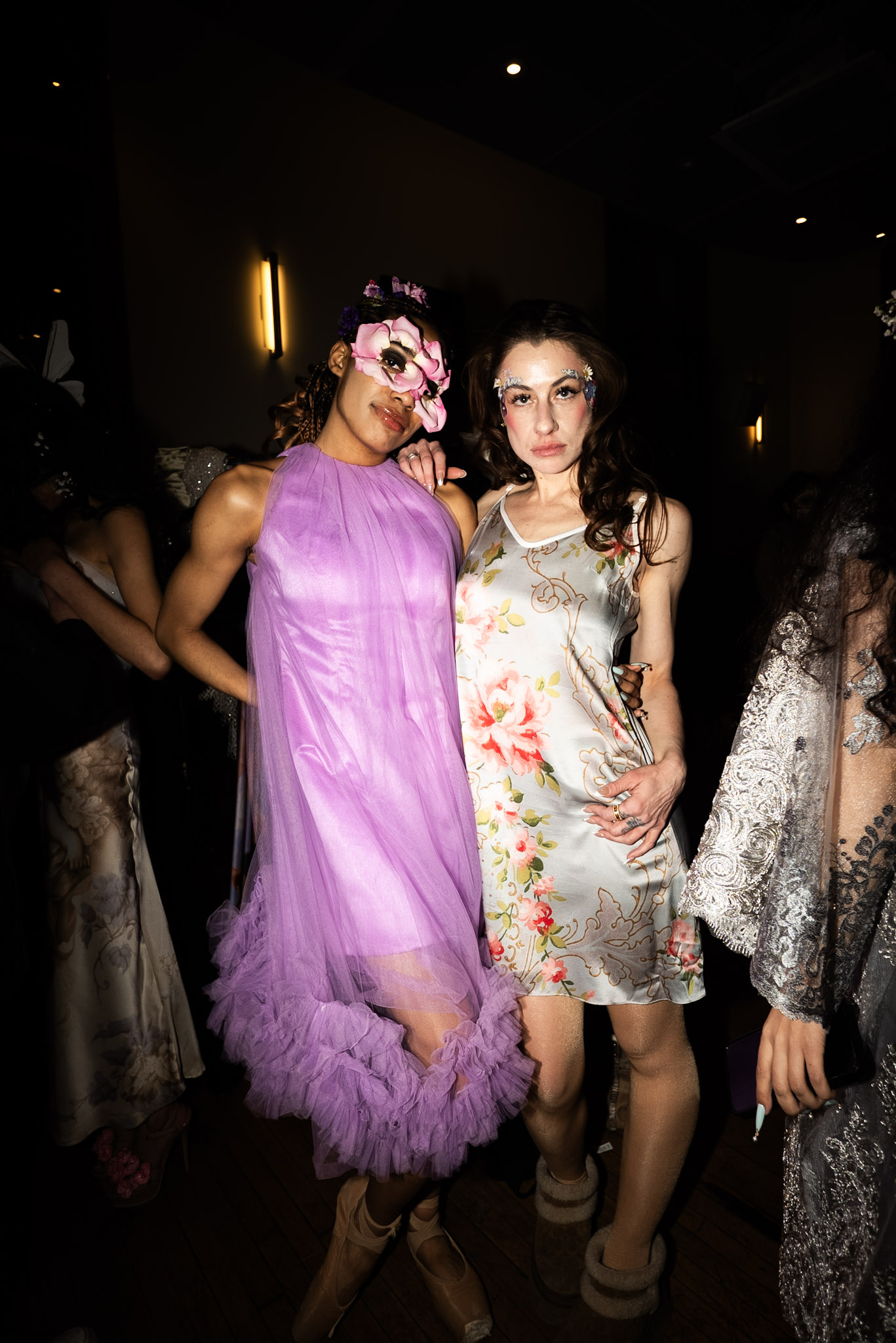 Designer Claire Comai backstage at Break Free NYFW 2026 with models wearing REHAB New York designs in New York City
