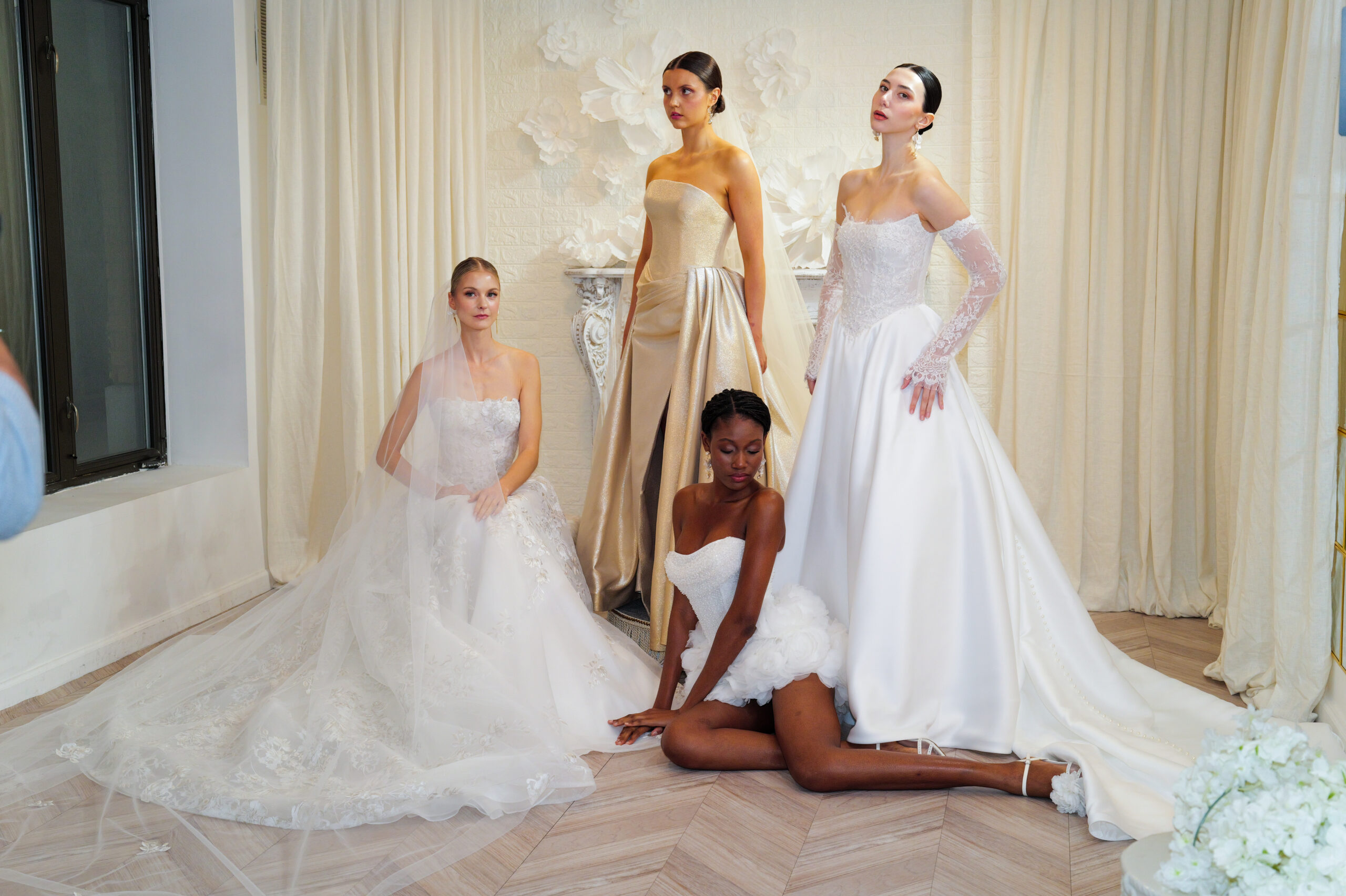 FW26 bridal collection by Jude Jowilson featuring modern wedding dresses with sculptural silhouettes and romantic details