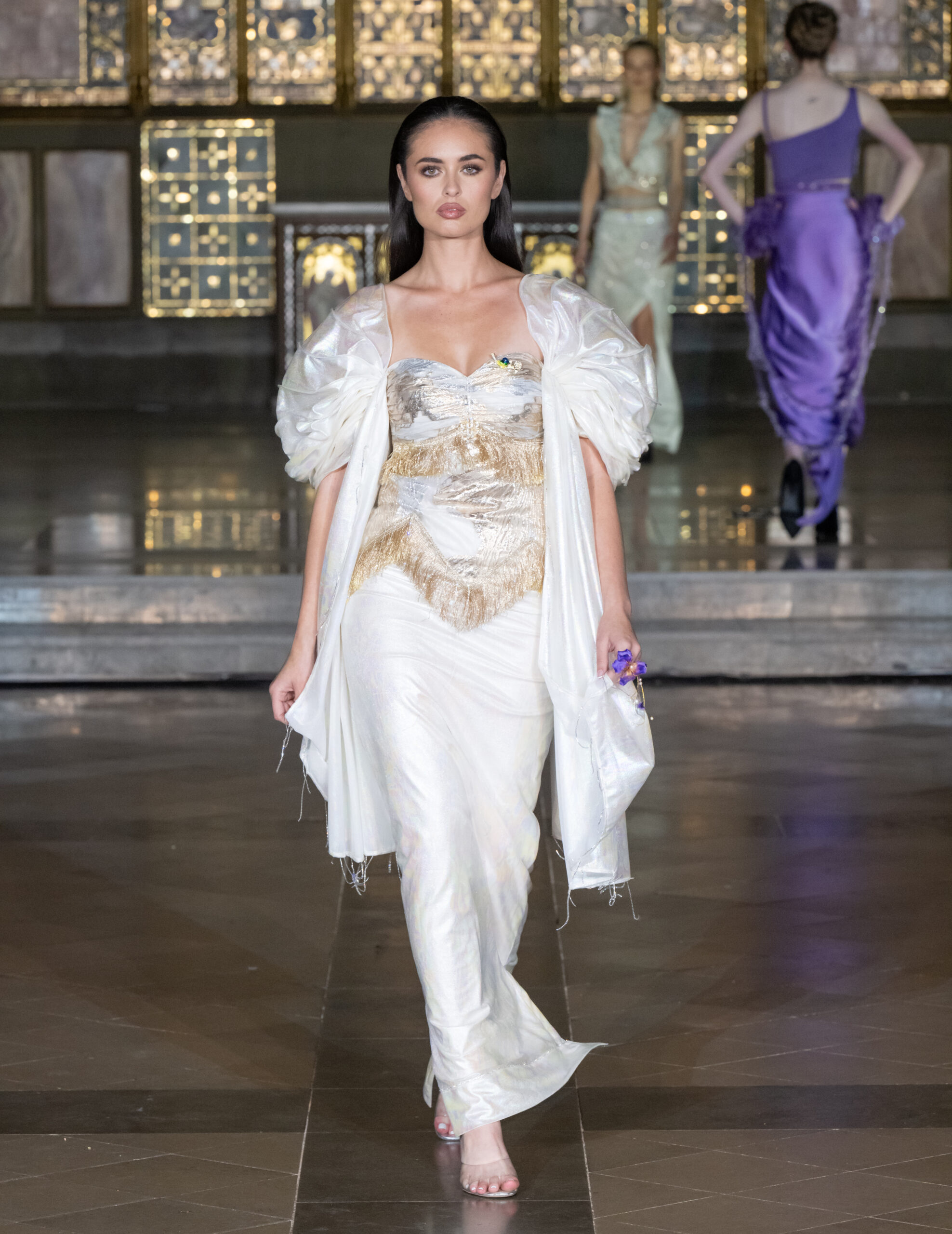 Saanjh by Saloni metallic gold and silver gown with voluminous sleeves at London Fashion Week AW2026 — Fashion Week and the City, St John's Church, Hyde Park.