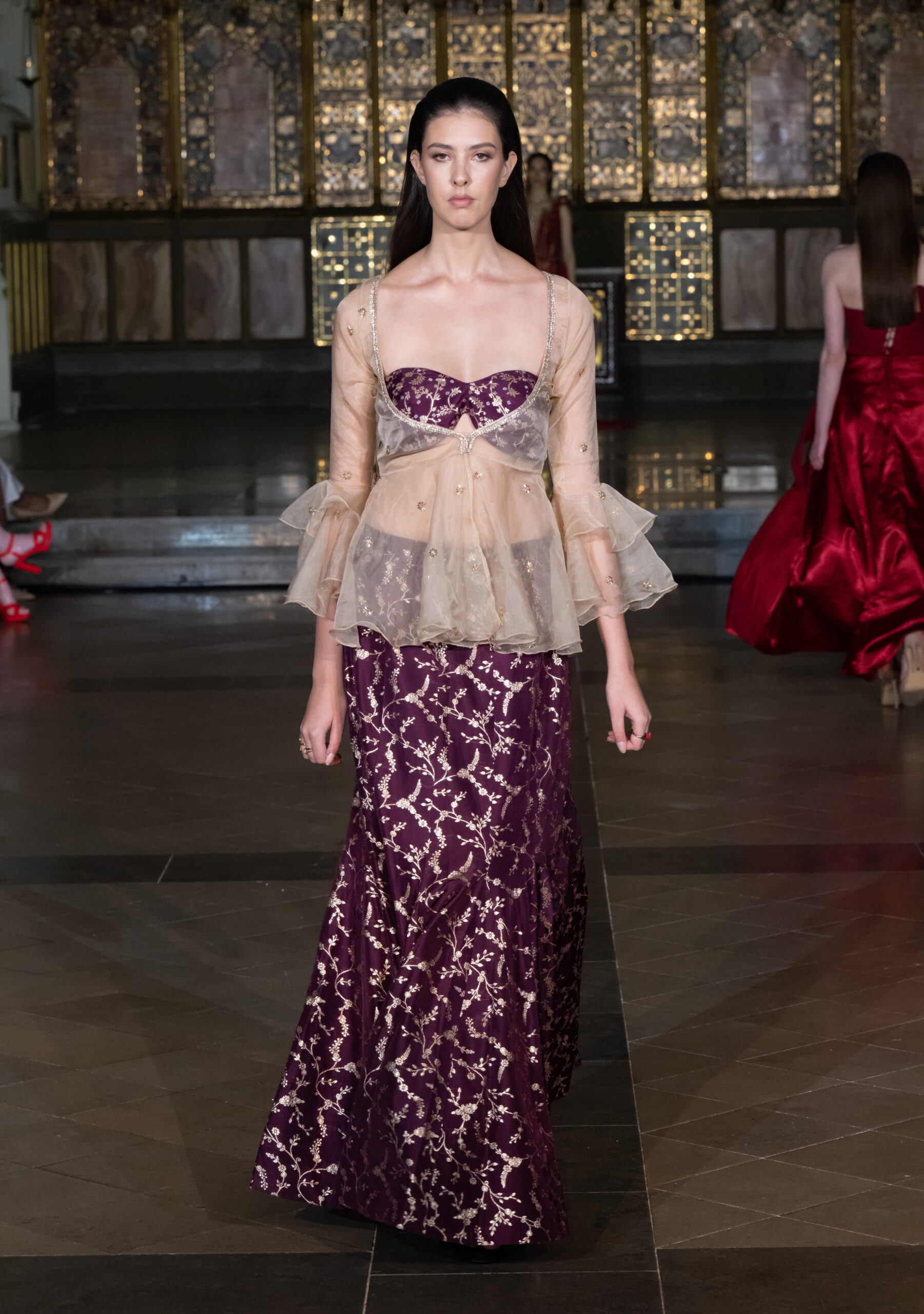 Zavoir by Swarali deep plum embroidered skirt with sheer ruffle blouse at London Fashion Week AW2026 — Fashion Week and the City, St John's Church, Hyde Park.