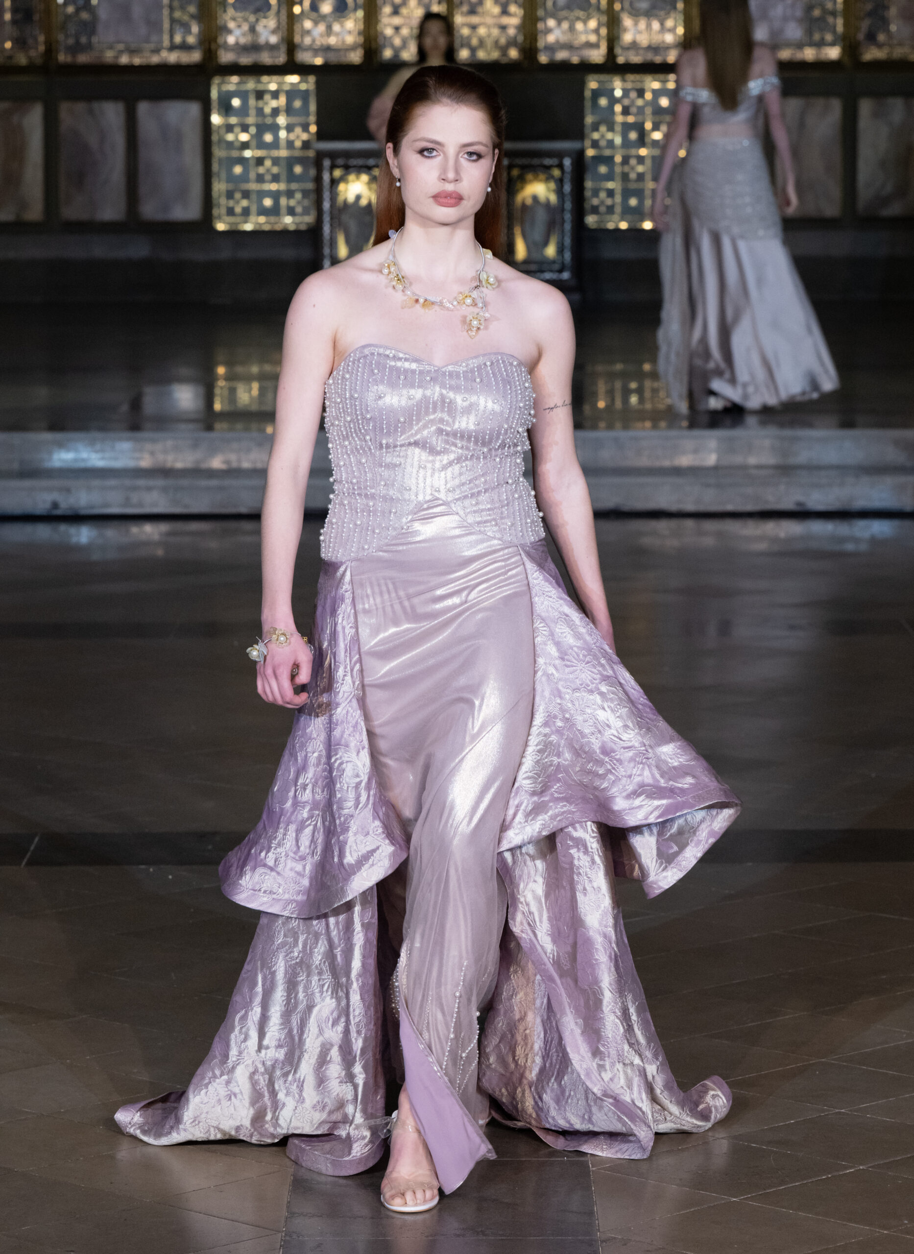 Zavoir by Swarali champagne off-shoulder embellished crop top and draped skirt at London Fashion Week AW2026 — Fashion Week and the City, St John's Church, Hyde Park.