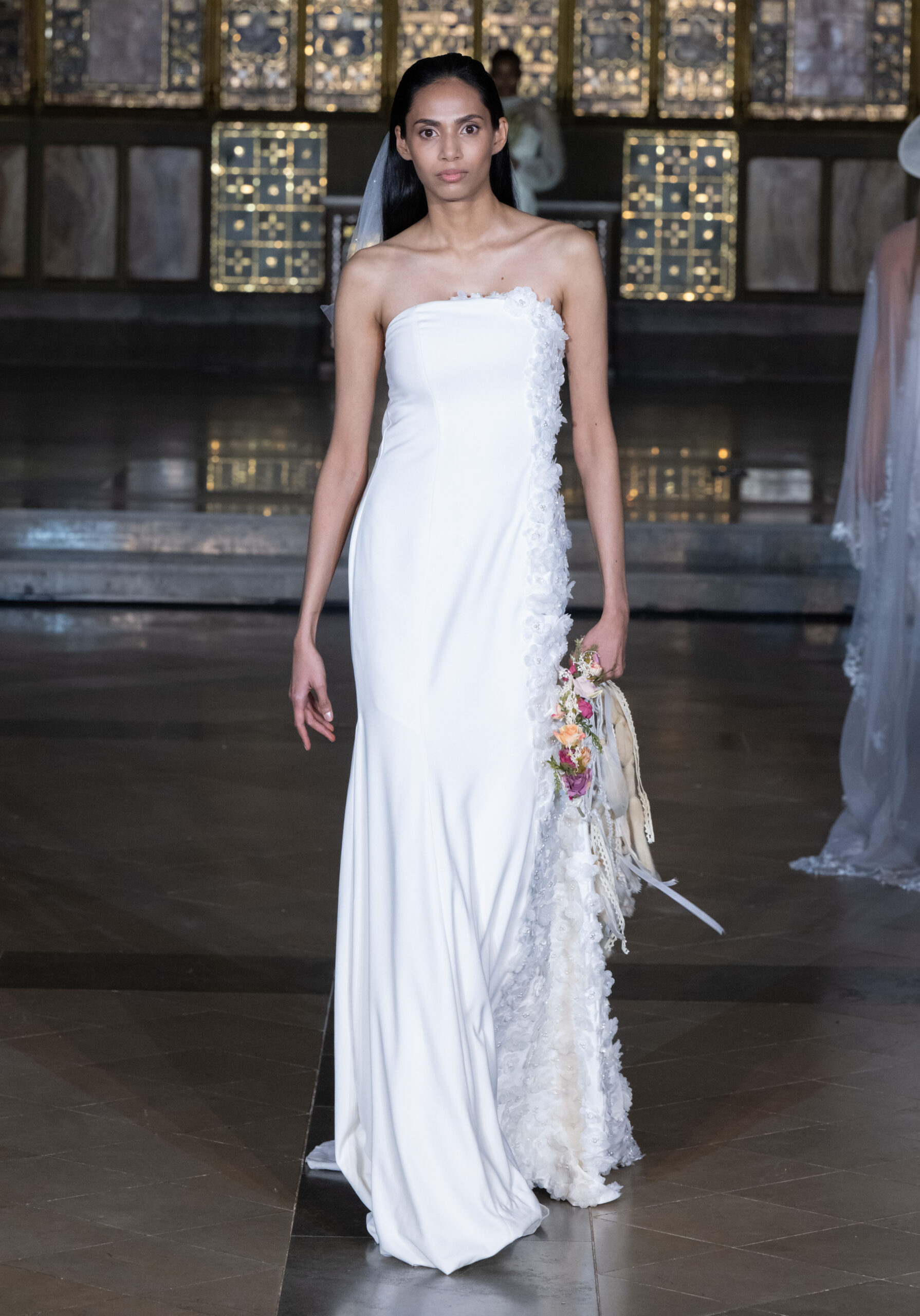 Sheers Bridal Boutique strapless column bridal gown with floral side detail at London Fashion Week AW2026 — Fashion Week and the City, St John's Church, Hyde Park.