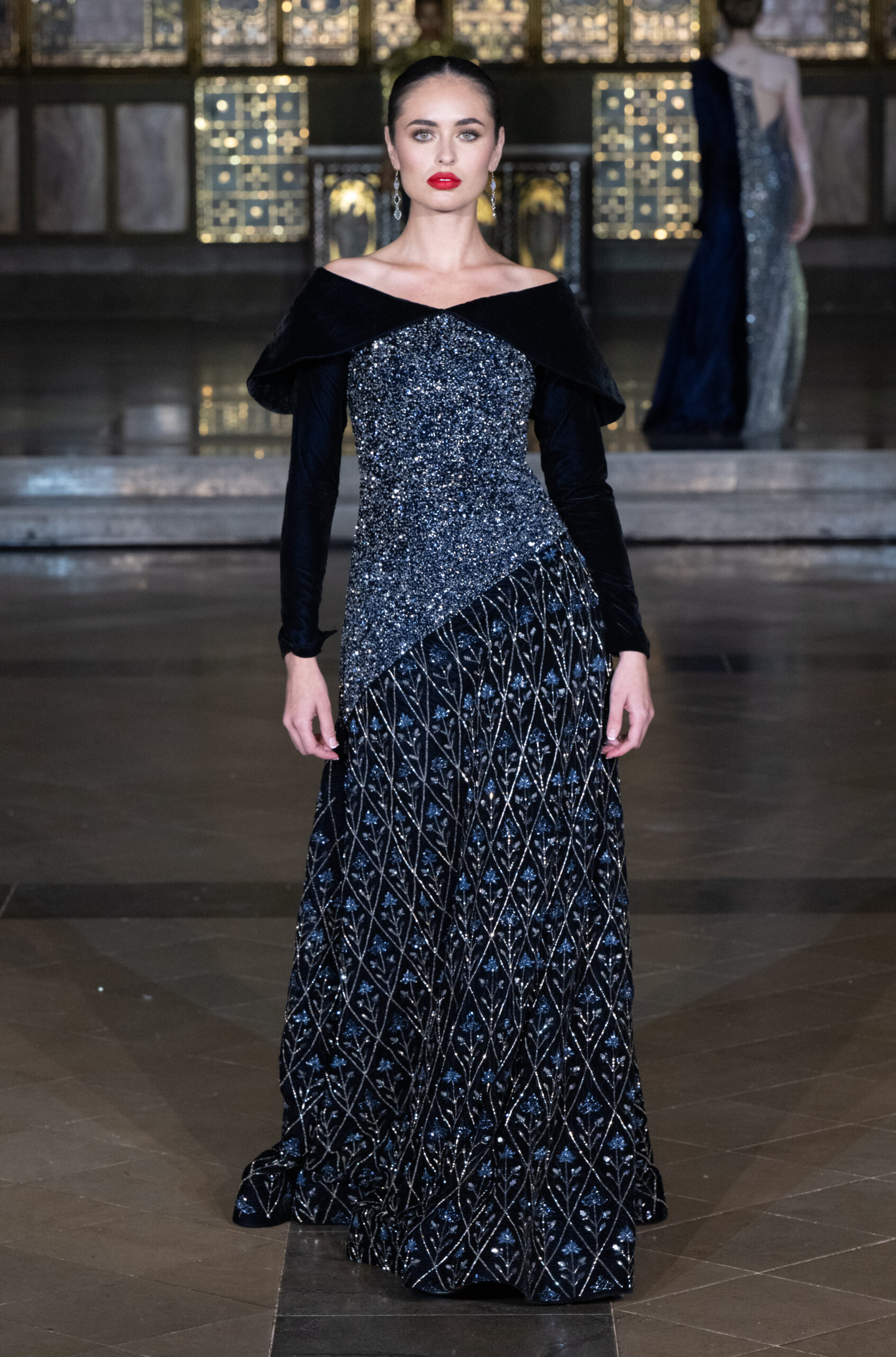 Fashion Week and the City Spotlight Series — black crystal-embellished gown with velvet off-shoulder detail at London Fashion Week AW2026, St John's Church, Hyde Park.