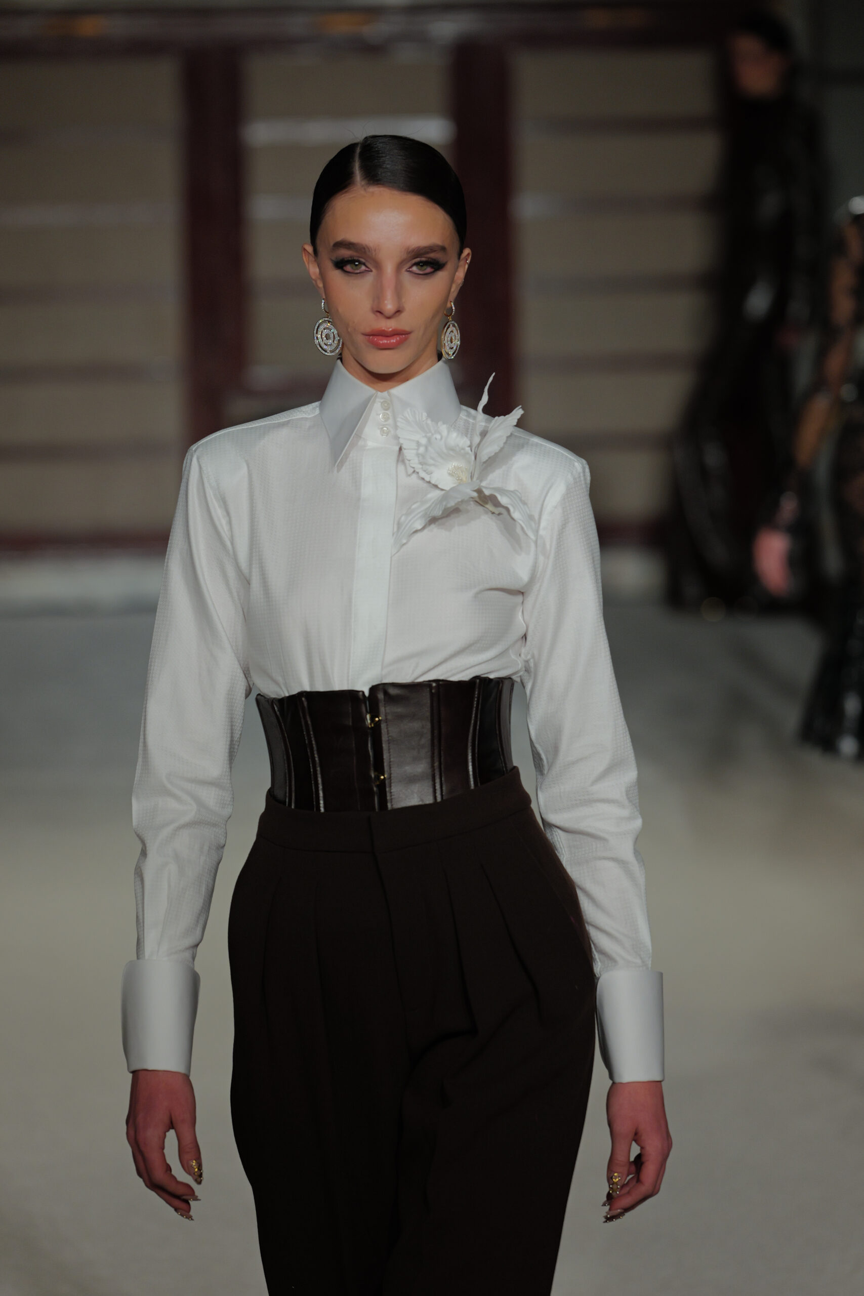 White button-down shirt black leather corset belt structured waist Sergio Hudson Fall 2026